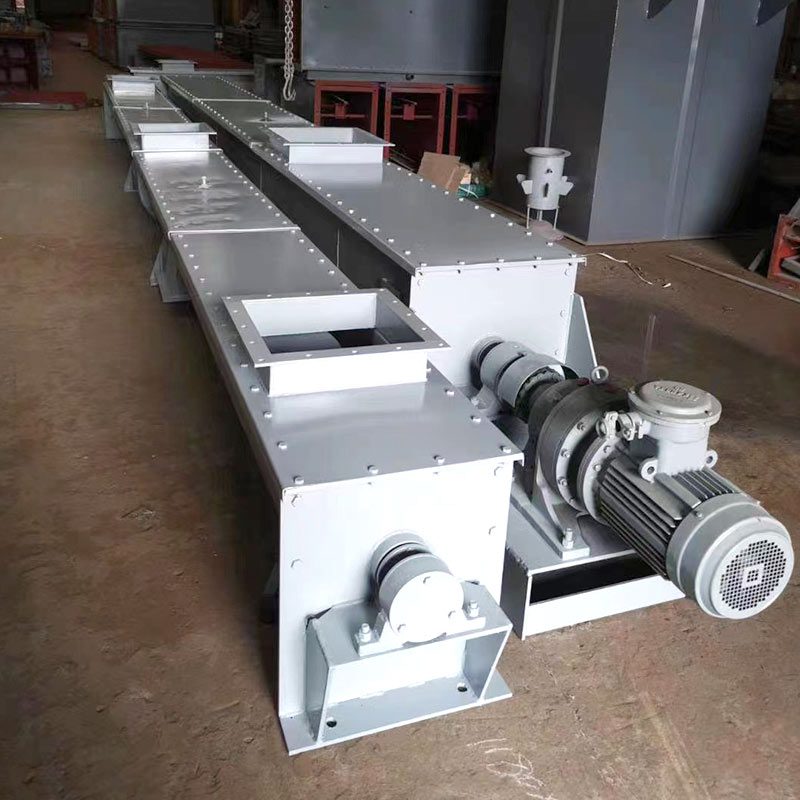 A U-type screw conveyor system employed in the fabrication of metal parts, showcasing advanced manufacturing technology.