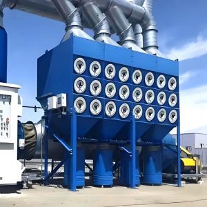 Beneath a clear blue sky, a large blue cartridge dust collector stands tall, designed for efficient dust capture in its industrial setting.