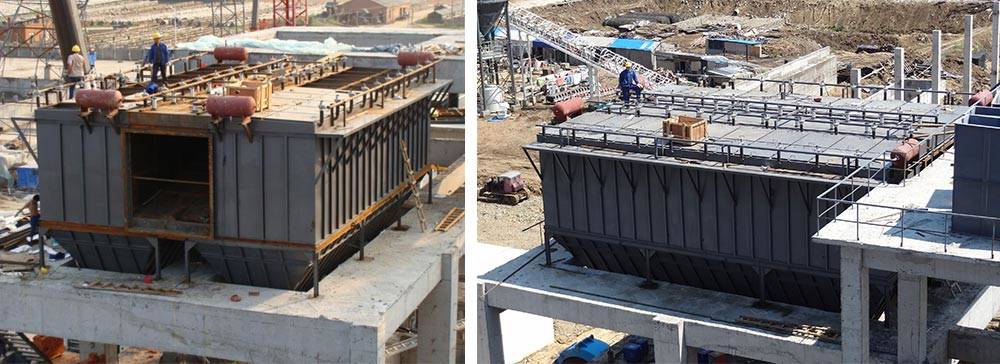 Showing the construction process of workers installing baghouse dust collector