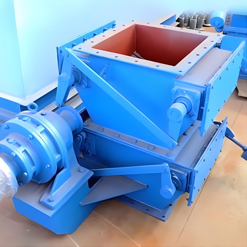 A blue industrial machine with a prominent metal box and a double decker flap gate valve, designed for robust performance.