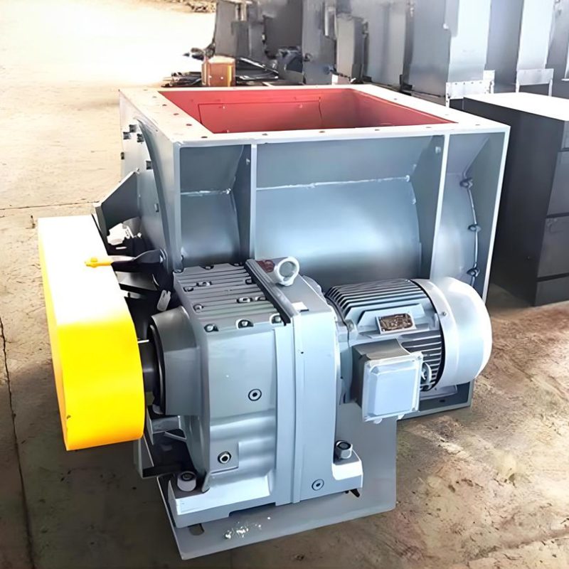 An industrial star-feeder rotary valve machine, characterized by a substantial metal box designed for optimal performance.