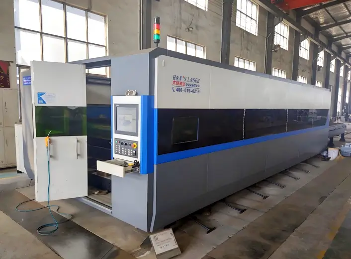 The sheet metal laser cutting machine is displayed in the factory, showcasing advanced technology for precise metal cutting.