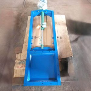 The blue Pneumatic Gate Valve rests securely on a tray, its robust design ready for installation in an industrial setting.