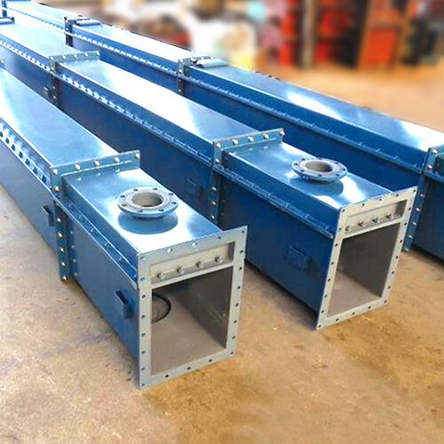 Three blue metal air slides are positioned on the concrete floor, ready for use, showcasing their durable construction and efficient design in the industrial workspace.